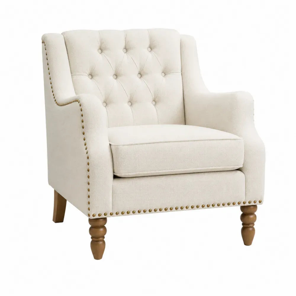 Sillón individual con reposabrazos respaldo capitoné tapizado en tejido de poliéster beige claro patas de madera de caucho marrón 75 x 70 x 80 cm